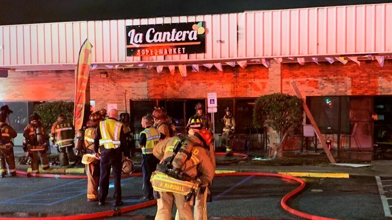 Firefighters on the scene of the fire in North Charleston Thursday night.