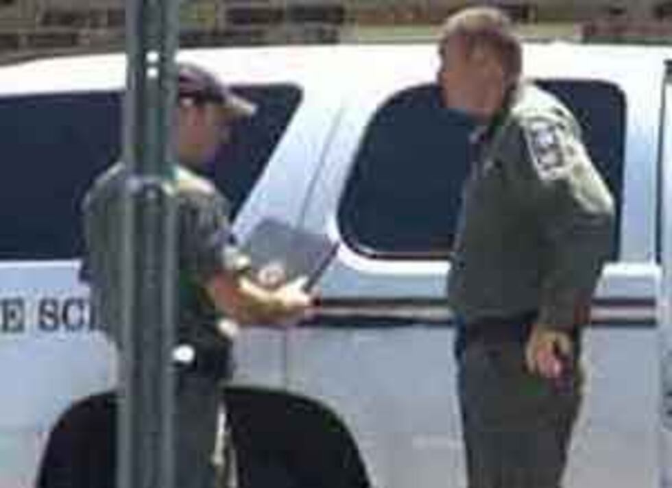 Investigators at Richardson' home following the death of her 2-month-old son.