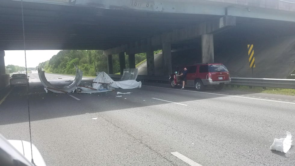 The College Park Road overpass has been reopened to traffic after a tractor trailer with an...