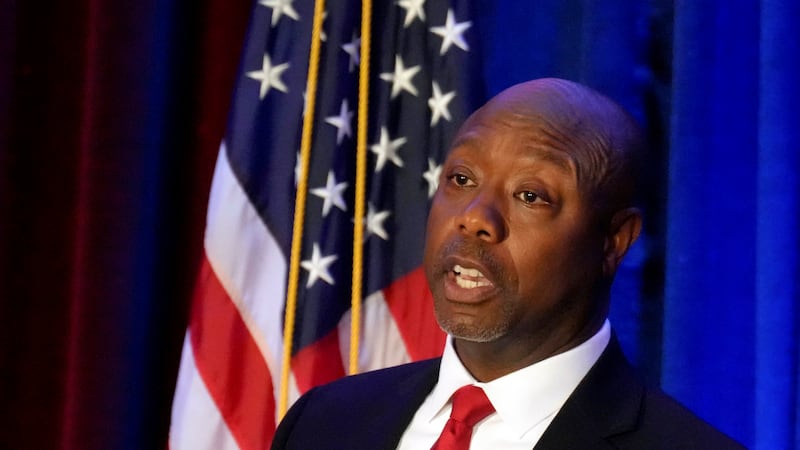 FILE - Sen. Tim Scott, R-S.C., gives a speech at a Black History Month dinner hosted by the...