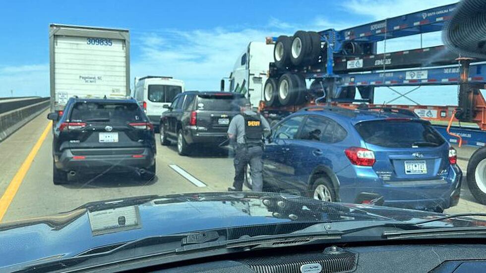 Drivers reported seeing deputies walking up the Wando Bridge between vehicles after a reported...