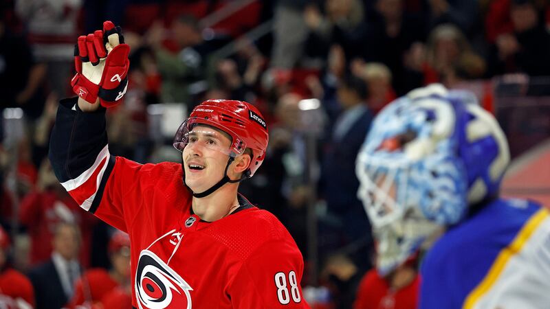 Carolina Hurricanes' Martin Necas (88) celebrates his game-winning goal as Buffalo Sabres...