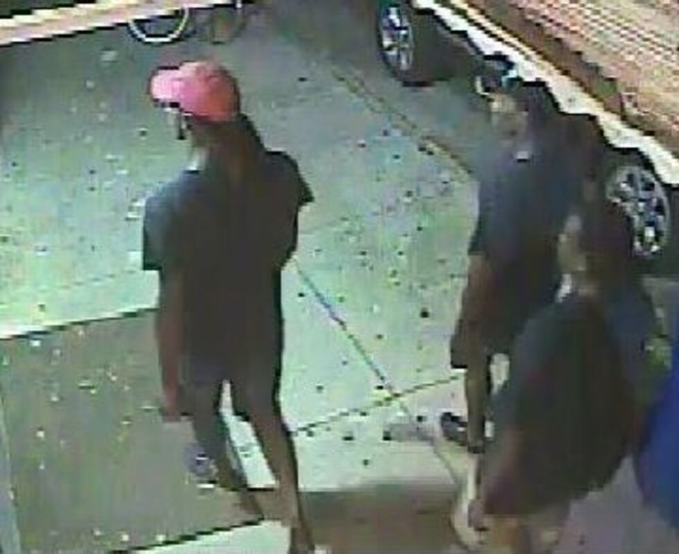 Surveillance pictures of the suspects taken near the robbery.