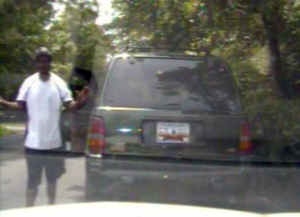 The suspect gets out of his car before fighting a police officer and stealing a police...