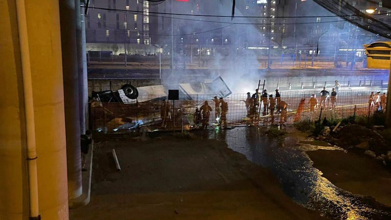 In this image made available by Italian State Police, Italian state police agents attend the...