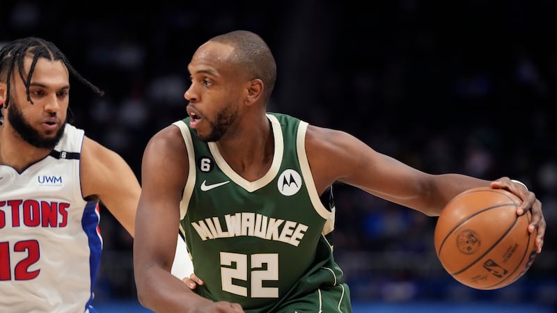 Milwaukee Bucks forward Khris Middleton (22) drives as Detroit Pistons forward Isaiah Livers...