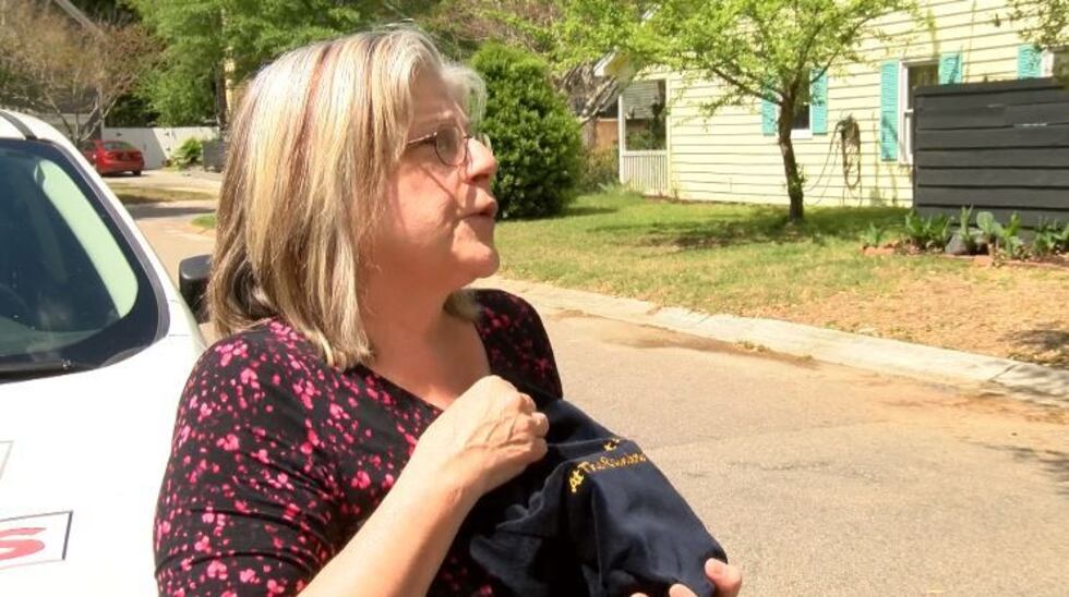 Judith Von carries ashes of Zane in an embroidered bag. (Source: Live 5)