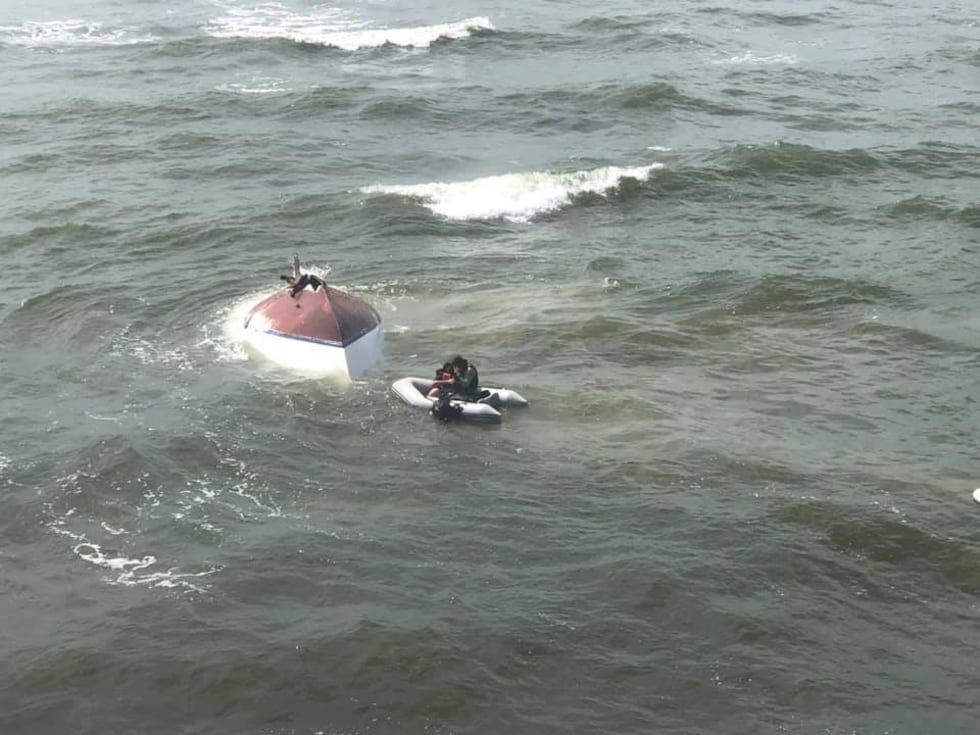A non-duty crew received a mayday call that the people were in distress after their boat sank,...
