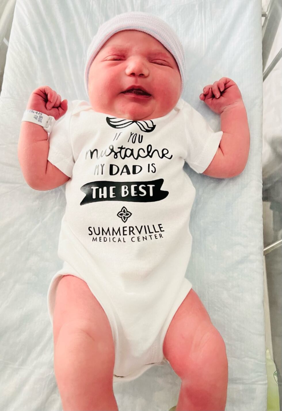 Zoe getting some rest with her onesie on Father's Day.